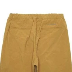 And WanderNYLON CHINO TUCK TAPERED PANTS - BROWN -Patagonia Clothing Shop NYLON CHINO TUCK TAPERED PANTS BROWN 20231010062923